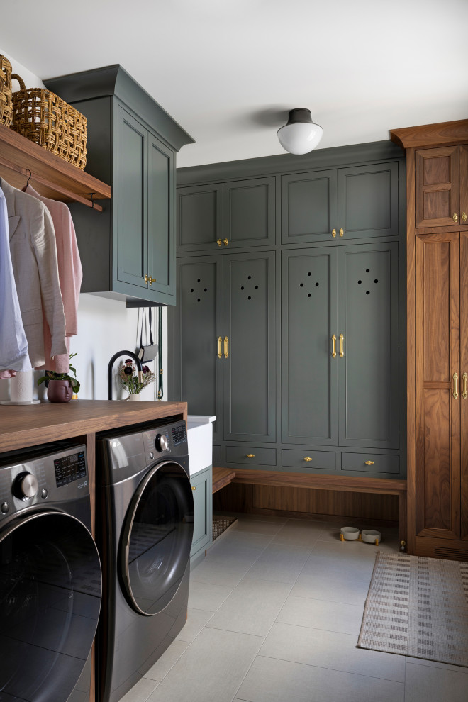 Inspiration for a mid-sized transitional porcelain tile and beige floor laundry room remodel in Minneapolis with white walls