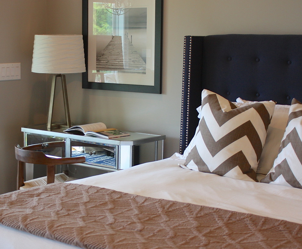 Example of a transitional bedroom design in Charlotte