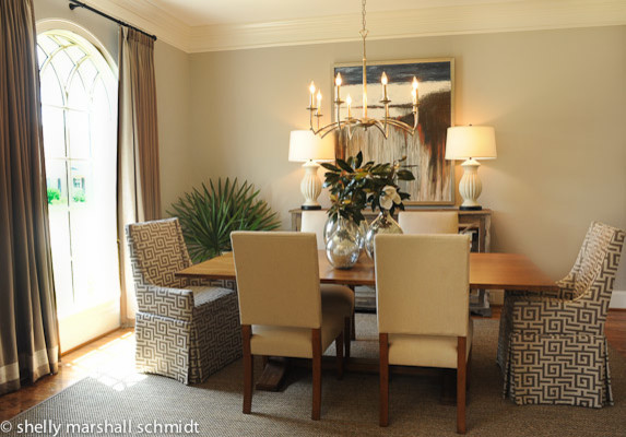Mid-sized transitional medium tone wood floor great room photo in Atlanta with white walls and no fireplace