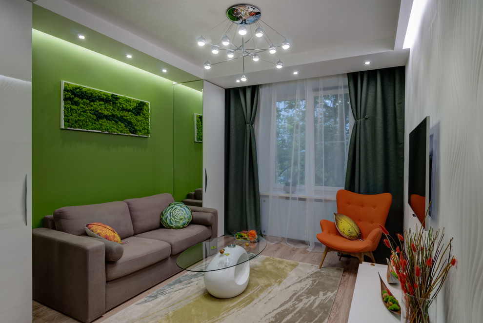 Свежая идея для дизайна: маленькая изолированная гостиная комната в современном стиле с зелеными стенами для на участке и в саду - отличное фото интерьера
