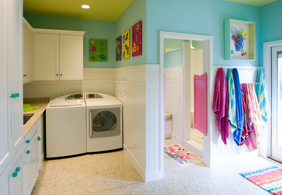 Inspiration for an eclectic laundry room in Other with blue walls.