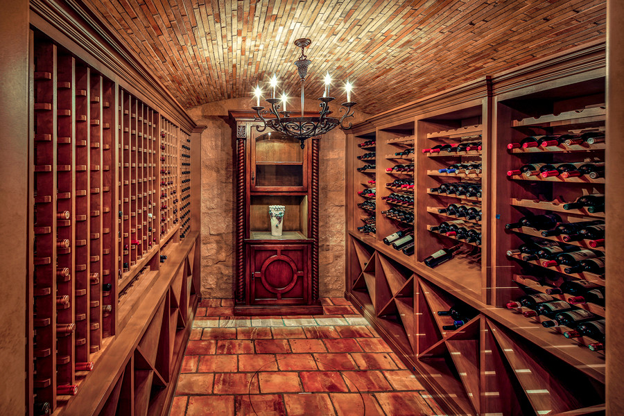 Photo of a mediterranean wine cellar in Orange County.
