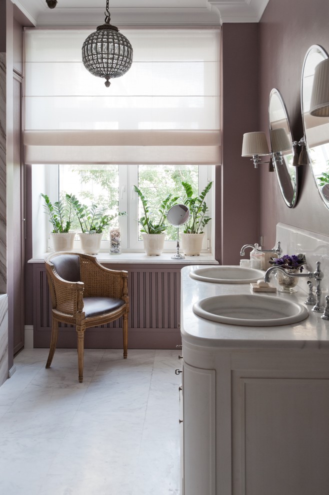 Photo of a small traditional bathroom in Moscow with recessed-panel cabinets, white cabinets and an undermount sink.