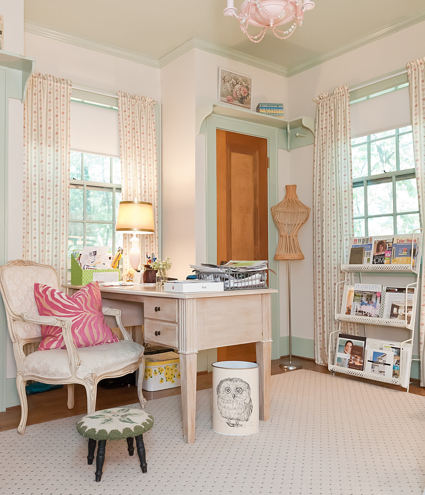 Photo of a traditional home office in Nashville with white walls and a freestanding desk.