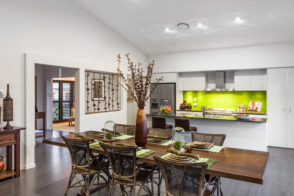 Large contemporary kitchen/dining combo in Brisbane with white walls, vinyl floors and no fireplace.