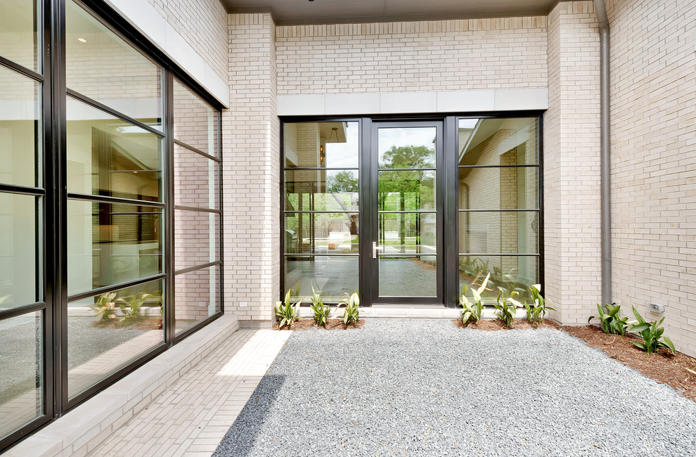 Photo of a modern front door in Dallas with a single front door and a glass front door.