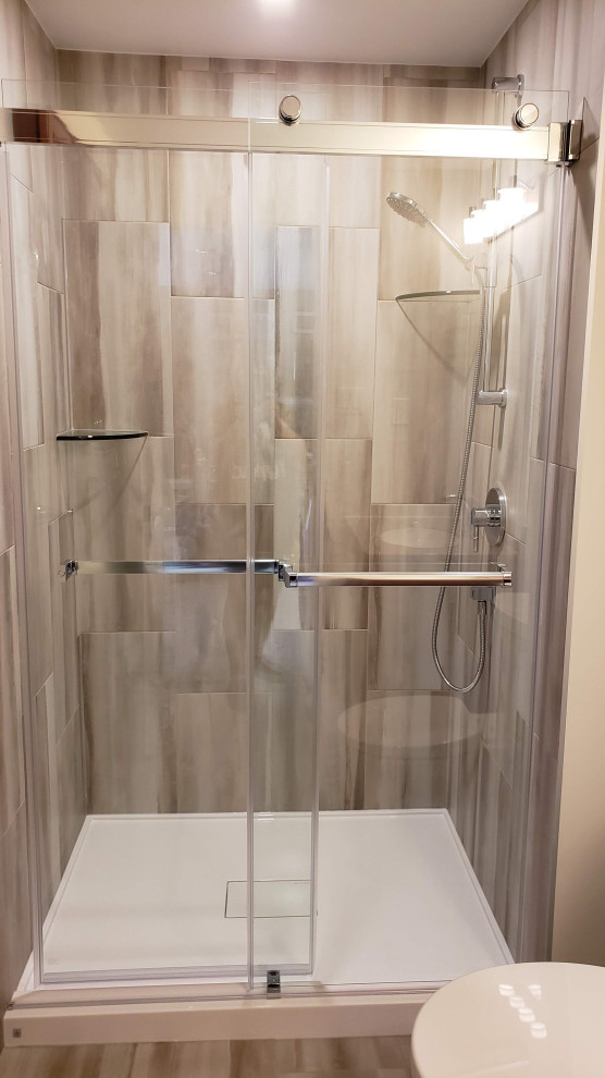Example of a small transitional multicolored tile and porcelain tile porcelain tile, multicolored floor and single-sink alcove shower design with recessed-panel cabinets, dark wood cabinets, a one-piece toilet, white walls, an undermount sink, beige countertops and a built-in vanity