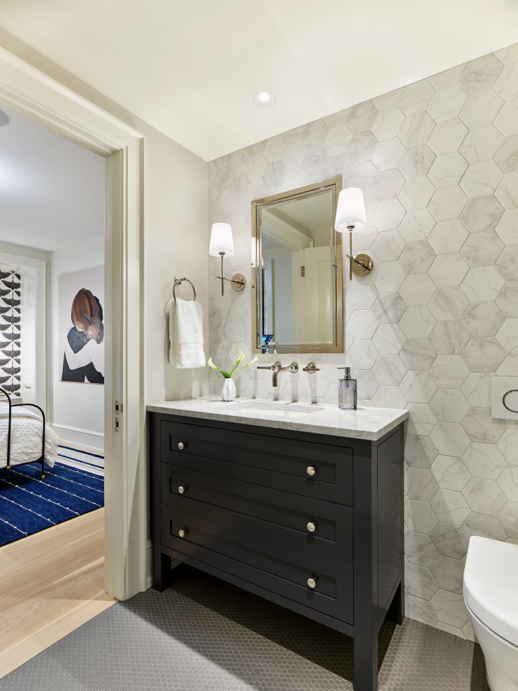 Design ideas for a transitional bathroom in Philadelphia with shaker cabinets, black cabinets, a one-piece toilet, gray tile, grey walls, mosaic tile floors, an undermount sink, grey floor, white benchtops, a single vanity and a freestanding vanity.