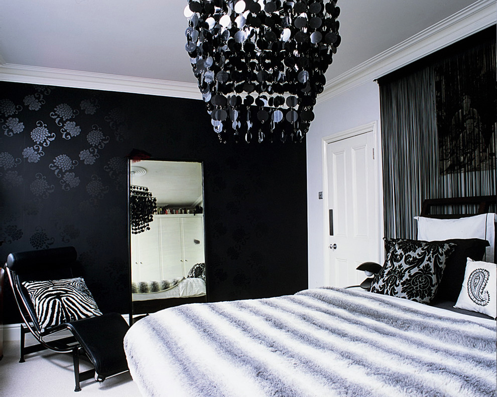 Inspiration for a contemporary bedroom in London with white walls.