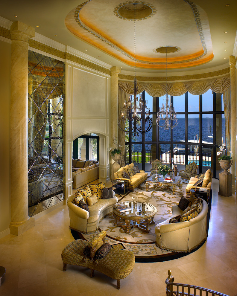 This is an example of an expansive mediterranean formal open concept living room in Miami with beige walls, porcelain floors, no tv and beige floor.