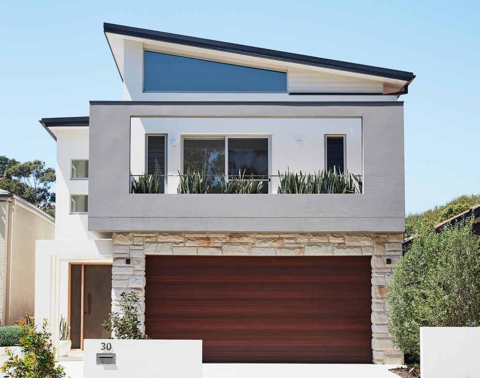 Inspiration for a contemporary two-storey house exterior in Sydney.