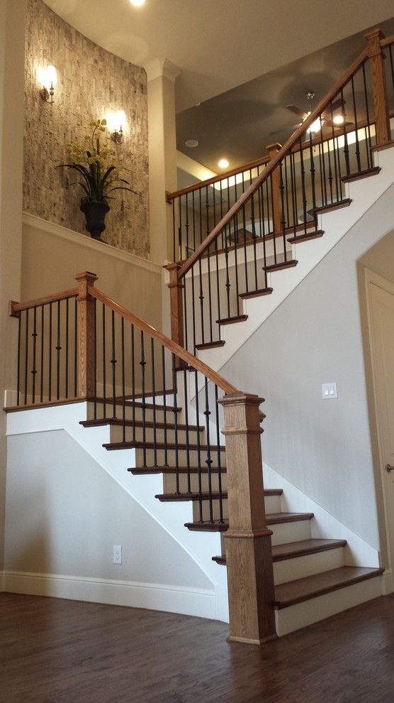 Example of a mid-sized arts and crafts wooden u-shaped staircase design in Dallas with painted risers