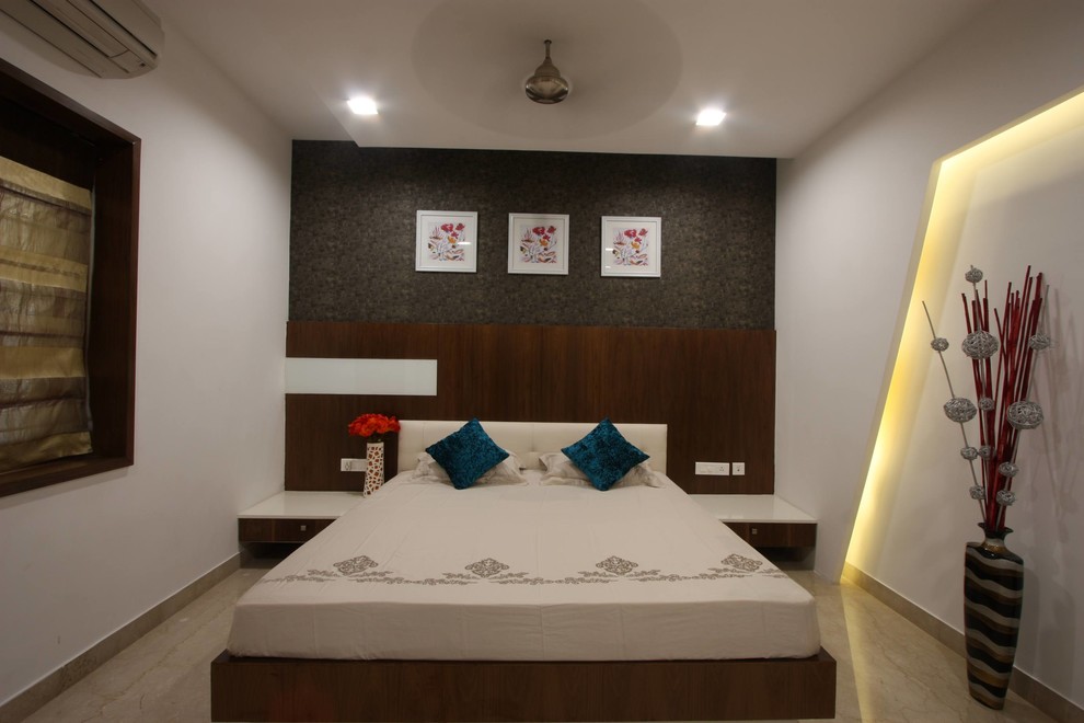 Contemporary bedroom in Chennai.