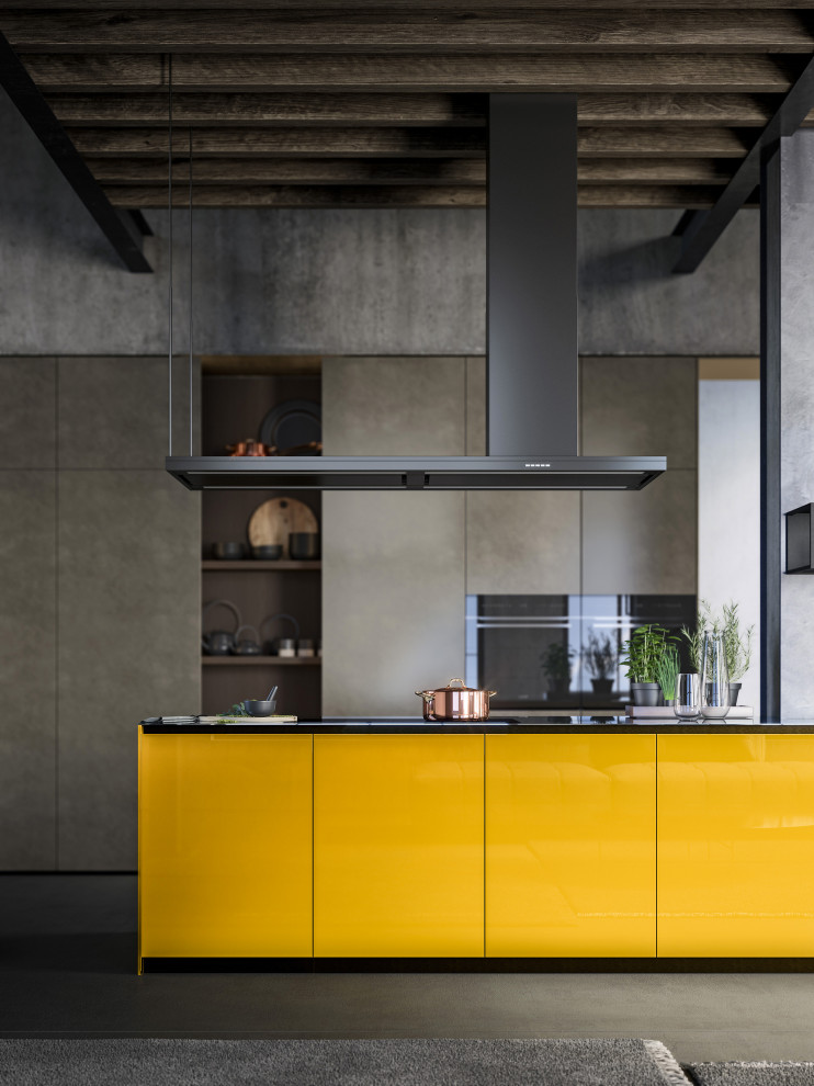 Example of a mid-sized minimalist kitchen design in Barcelona with an integrated sink, flat-panel cabinets, gray cabinets, onyx countertops, an island and gray countertops