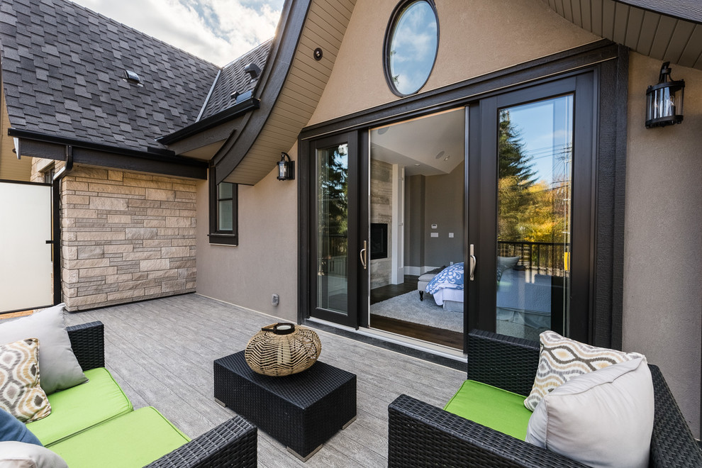 This is an example of a mid-sized transitional balcony in Calgary.