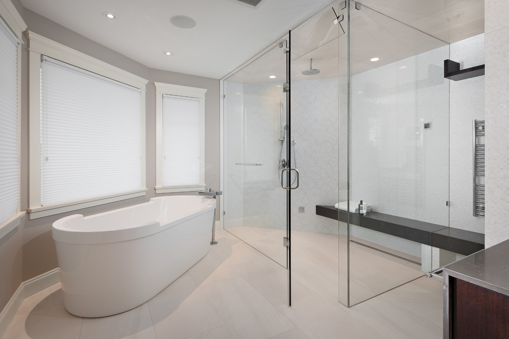 Freestanding bathtub - large transitional master white tile ceramic tile and beige floor freestanding bathtub idea in Vancouver with flat-panel cabinets, dark wood cabinets, white walls, wood countertops, a hinged shower door and gray countertops