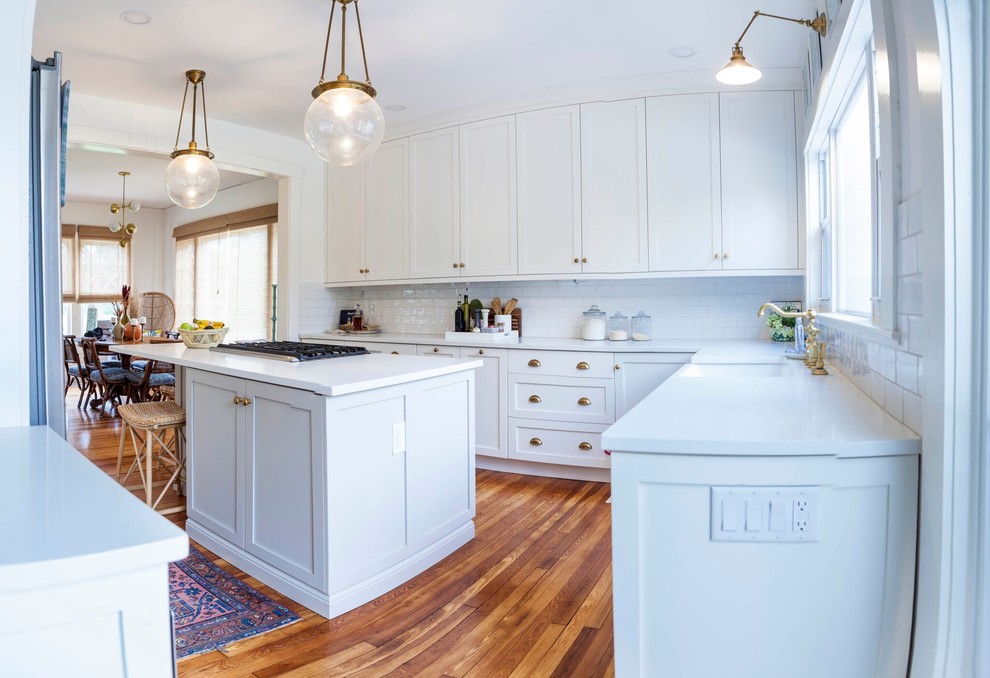 Example of a mid-sized transitional kitchen design in Miami