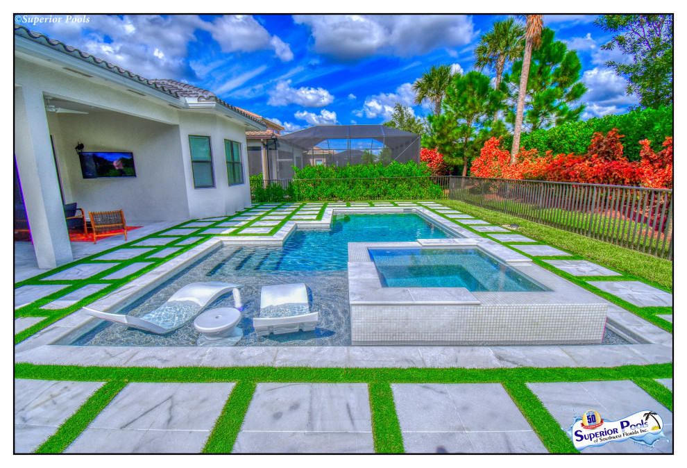Inspiration for a mid-sized modern courtyard custom-shaped natural pool in Tampa with a pool house and decking.
