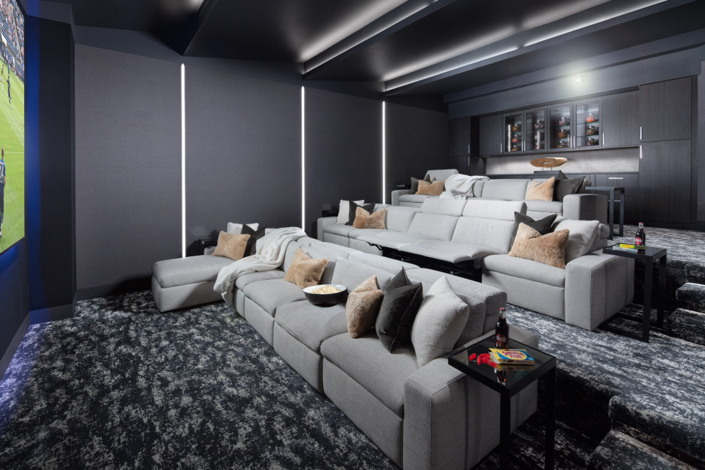 Example of a transitional enclosed carpeted and gray floor home theater design in Denver with gray walls and a projector screen