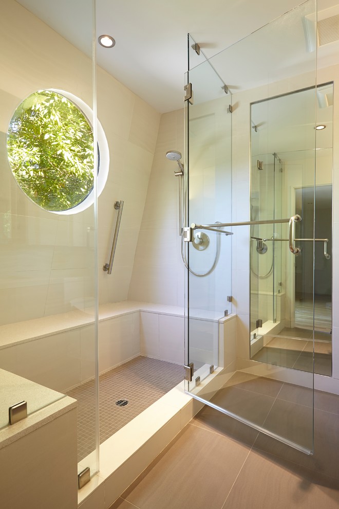 Inspiration for a contemporary beige tile alcove shower remodel in San Francisco