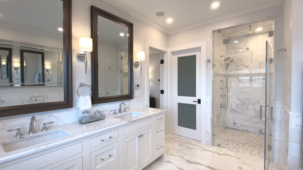 Open shower - mid-sized transitional master yellow tile and marble tile marble floor, gray floor and double-sink open shower idea in Boston with recessed-panel cabinets, white cabinets, a one-piece toilet, white walls, an undermount sink, marble countertops, gray countertops and a built-in vanity