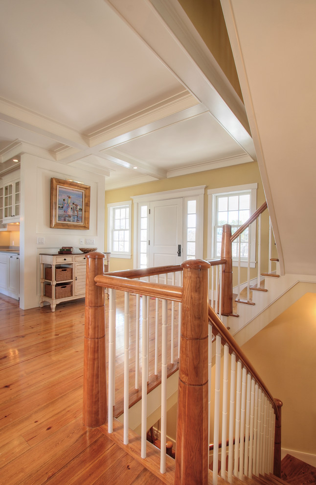 Design ideas for a mid-sized beach style wood straight staircase in Philadelphia with wood risers.