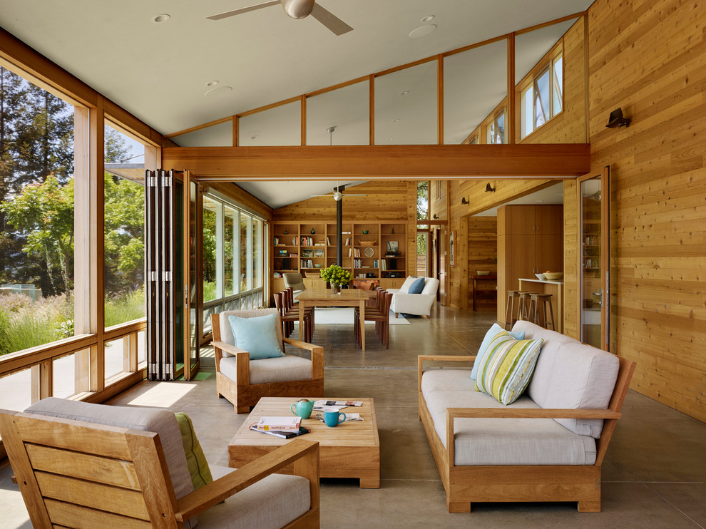 Inspiration for a large contemporary sunroom in San Francisco with concrete floors, a standard ceiling and grey floor.