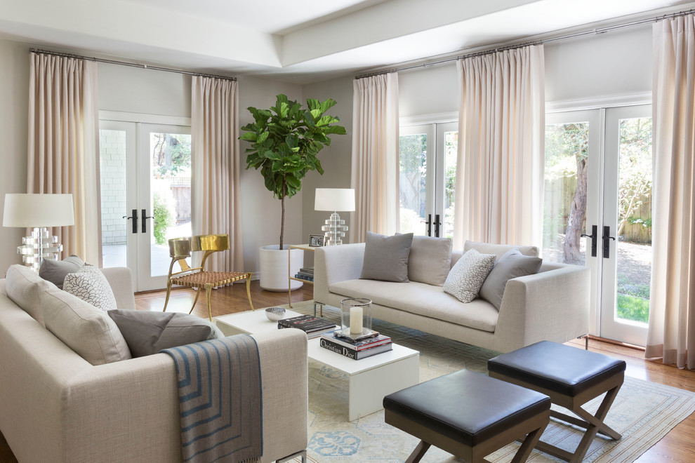 Mid-sized transitional formal living room in San Francisco with white walls and medium hardwood floors.