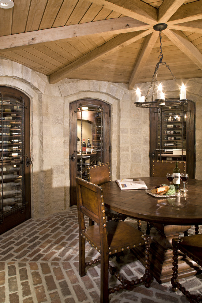 Photo of a traditional wine cellar in Minneapolis with brick floors.