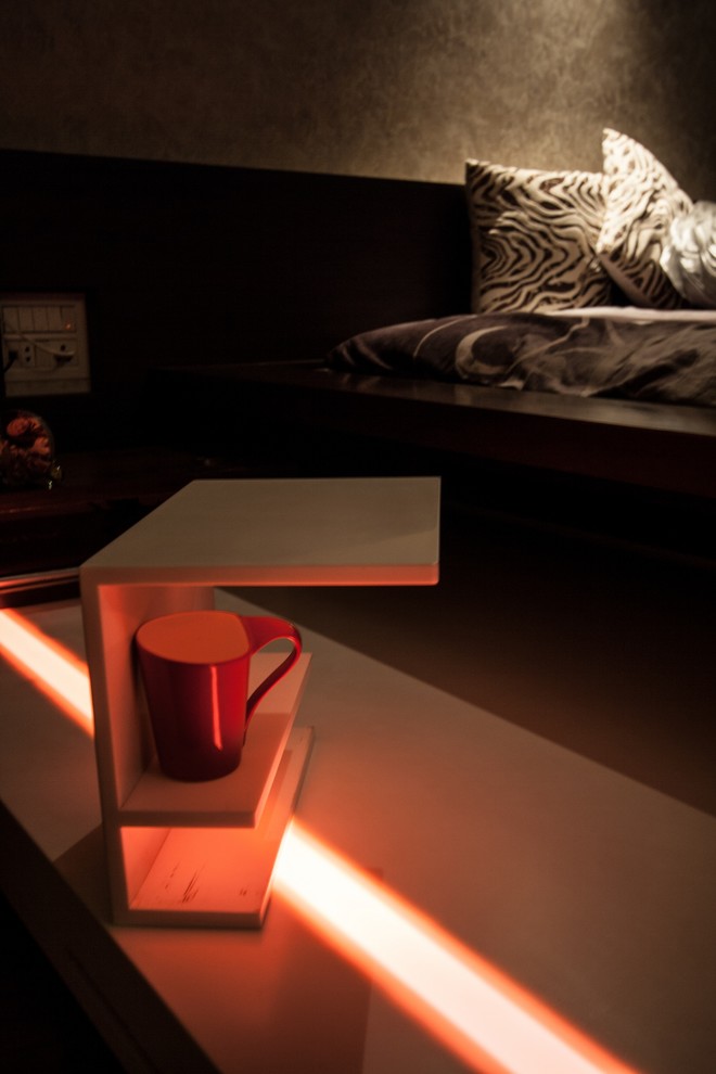 Inspiration for a large contemporary master dark wood floor bedroom remodel with white walls