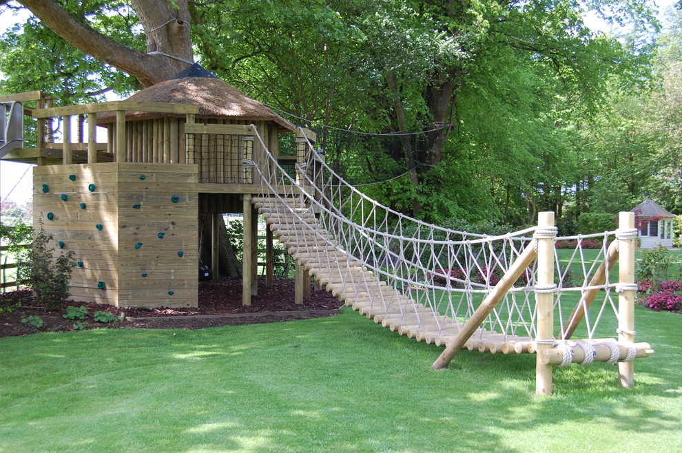 Traditional garden in Cheshire with with outdoor playset.