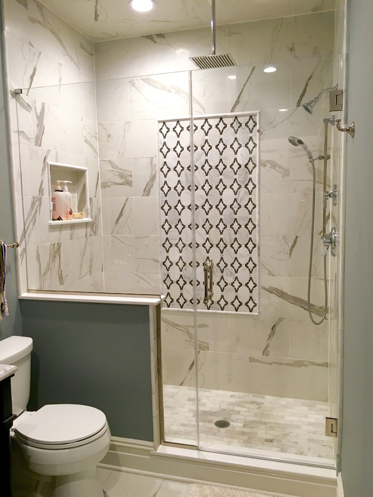 Mid-sized transitional 3/4 black tile and porcelain tile marble floor alcove shower photo in Newark with a two-piece toilet, gray walls and marble countertops