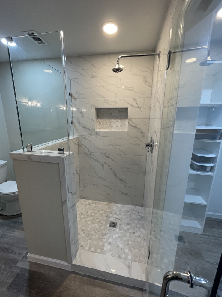 Photo of a large contemporary bathroom in Houston with shaker cabinets, grey cabinets, a freestanding bath, a built-in sink, engineered stone worktops, grey worktops, double sinks and a built in vanity unit.