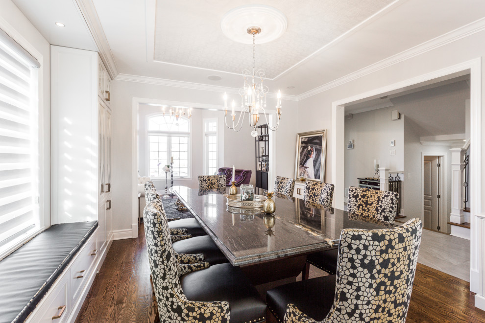 Large traditional open plan dining in Montreal with grey walls, dark hardwood floors, wallpaper and brown floor.