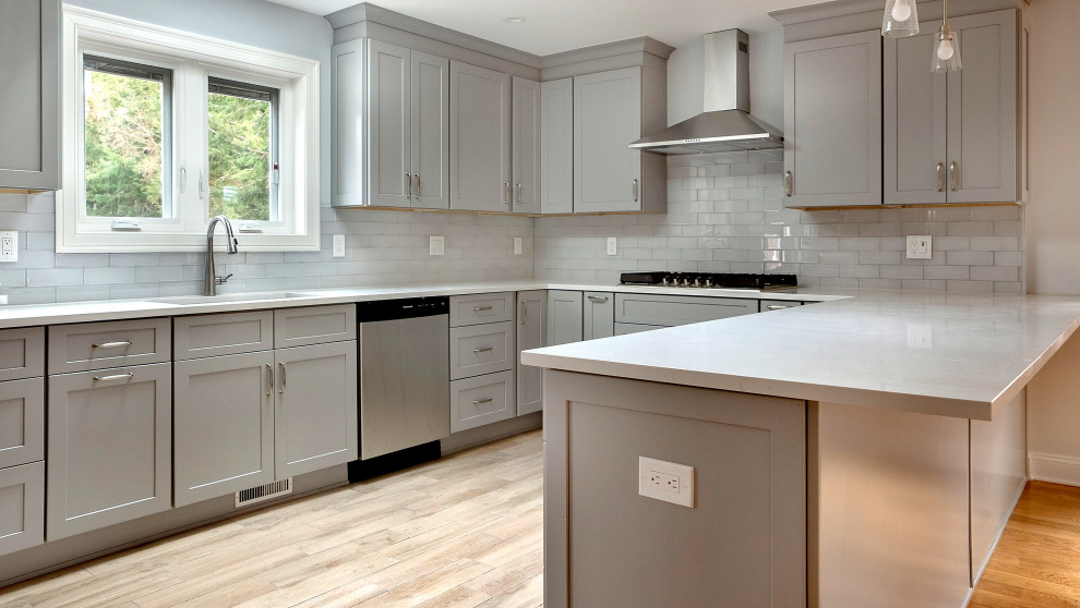 Gray Kitchen with Peninsula and Subway Tile