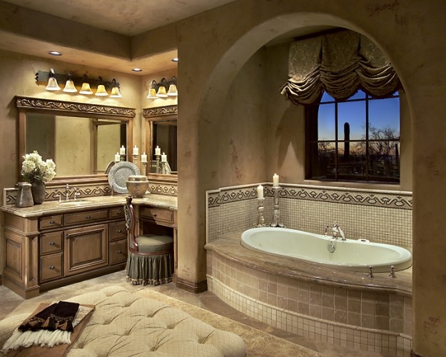 Photo of a traditional bathroom in Phoenix with an undermount sink, medium wood cabinets, granite benchtops, a drop-in tub, mosaic tile and beige walls.
