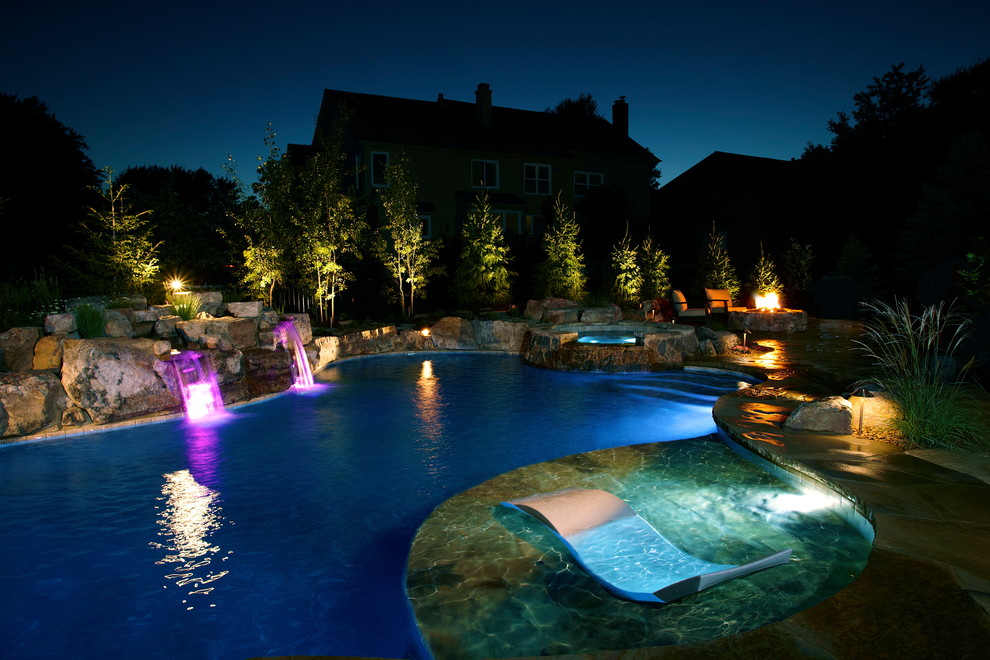 Mountain style pool photo in Kansas City