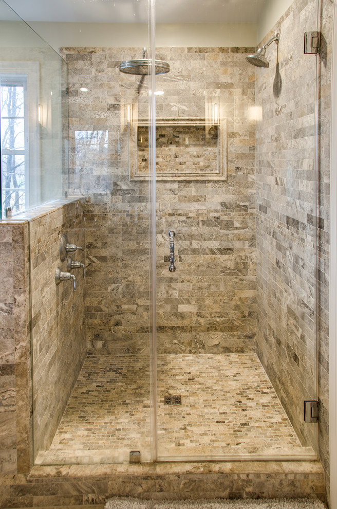 Example of a mid-sized mountain style master stone tile travertine floor bathroom design in DC Metro with furniture-like cabinets, brown cabinets, a two-piece toilet, beige walls and marble countertops