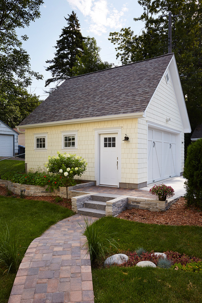 Photo of a mid-sized transitional detached shed and granny flat in Minneapolis.
