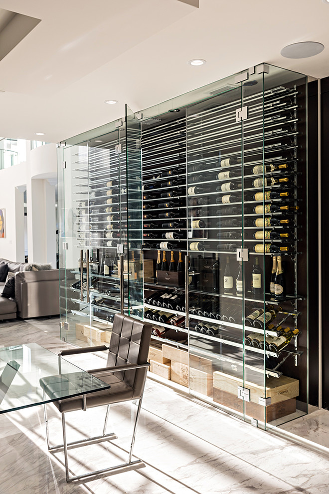 Inspiration for a contemporary wine cellar in Miami with display racks.