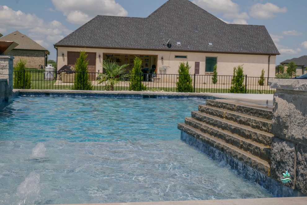 Design ideas for an expansive retro back private and rectangular natural swimming pool in Dallas with decking.