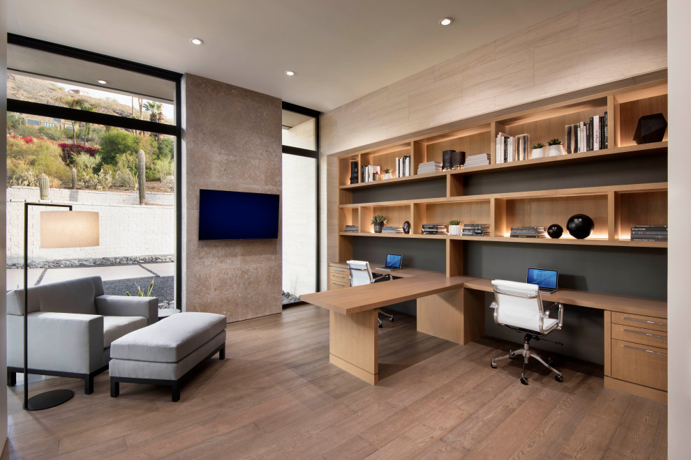 Design ideas for a large contemporary study room in Phoenix with dark hardwood floors and a built-in desk.