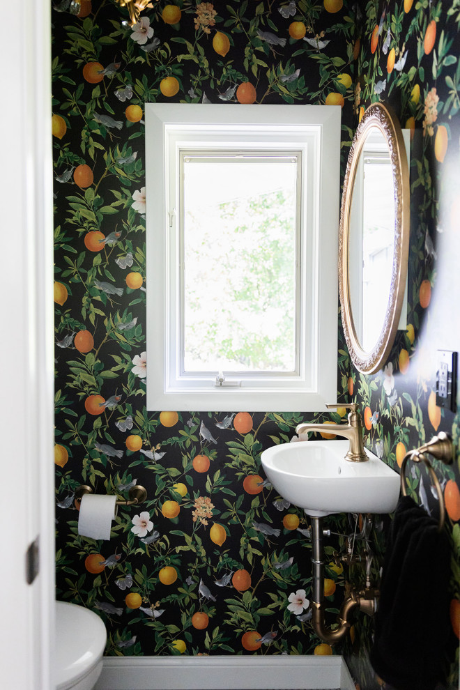 Small eclectic porcelain tile, gray floor and wallpaper powder room photo in Other with a wall-mount sink
