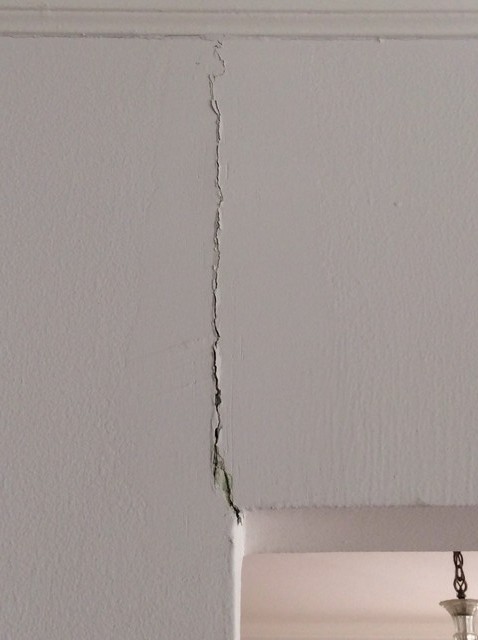 Smashed Wall Entry Crack over entryway