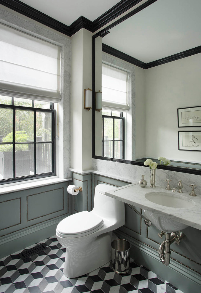 This is an example of a traditional powder room in Boston with grey walls, an undermount sink and multi-coloured floor.