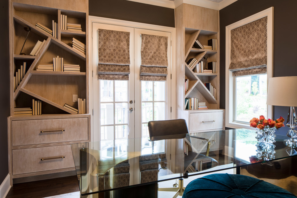 Photo of a mid-sized transitional study room in Atlanta with dark hardwood floors, a freestanding desk, black walls, no fireplace and brown floor.