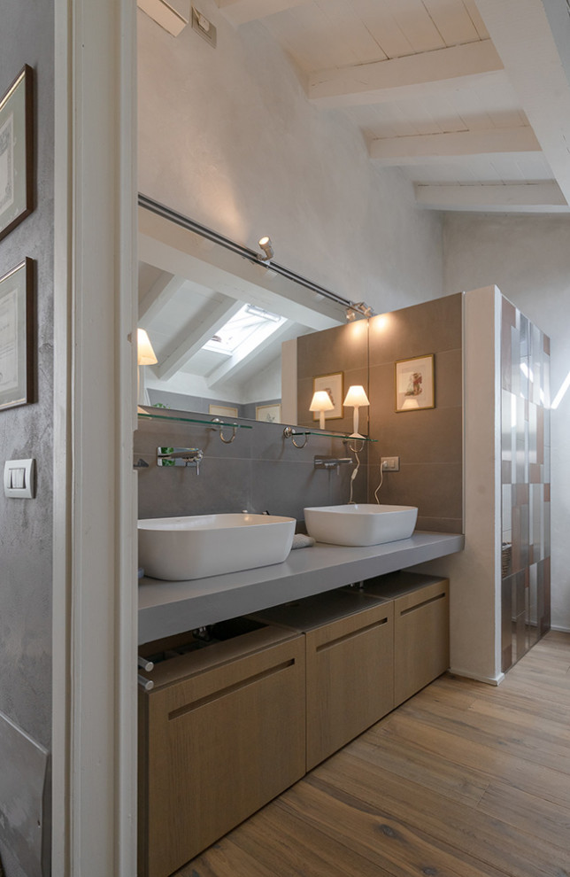 Photo of a medium sized traditional shower room bathroom in Other with light wood cabinets, ceramic tiles, grey walls, light hardwood flooring, a vessel sink, grey worktops, double sinks, a floating vanity unit and exposed beams.