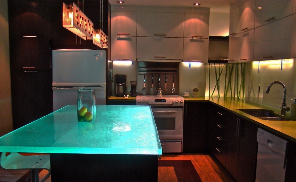 Kitchen in Montreal with glass benchtops.
