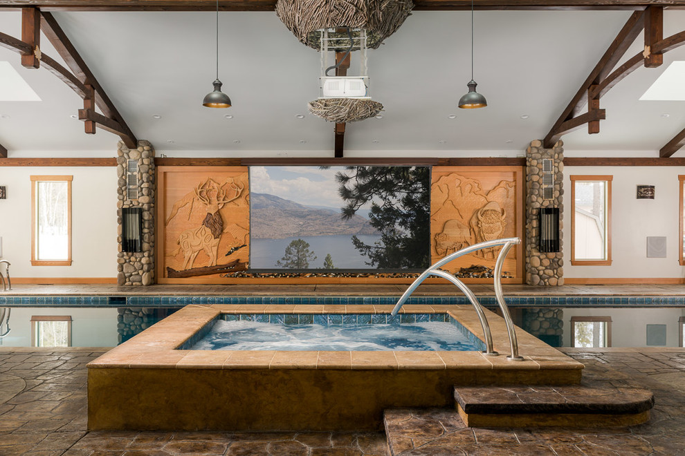 Example of a mid-sized mountain style backyard rectangular lap pool house design in Calgary