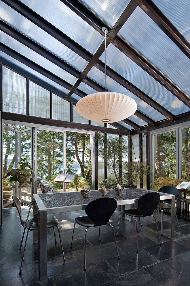 This is an example of a contemporary sunroom in Seattle.